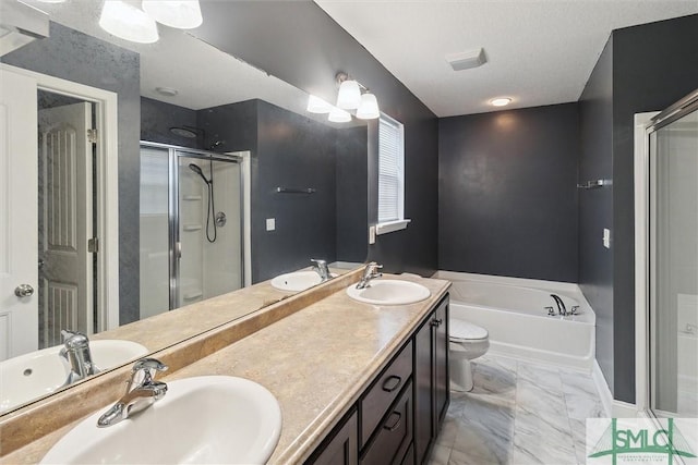 full bathroom featuring independent shower and bath, vanity, and toilet