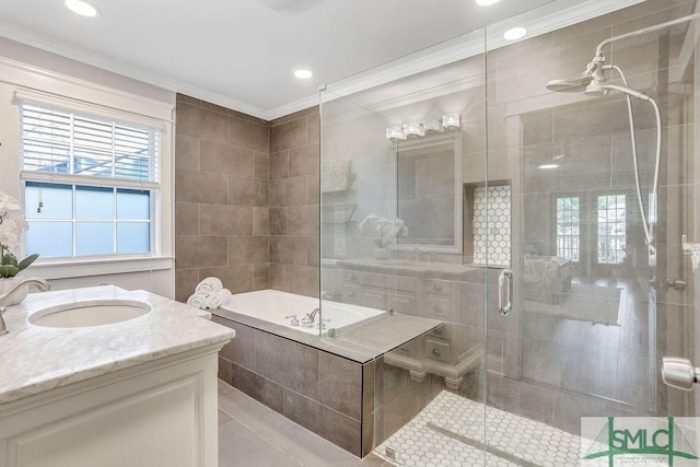 bathroom with crown molding, vanity, tile patterned flooring, and a shower with door