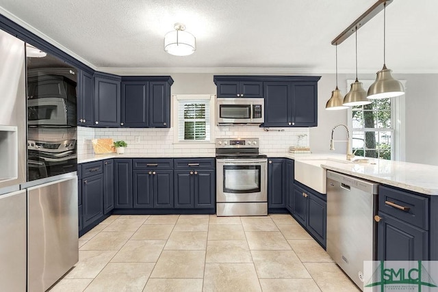 kitchen with light tile patterned flooring, light stone counters, hanging light fixtures, stainless steel appliances, and decorative backsplash