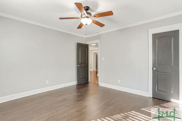 unfurnished room featuring crown molding, ceiling fan, and dark hardwood / wood-style flooring