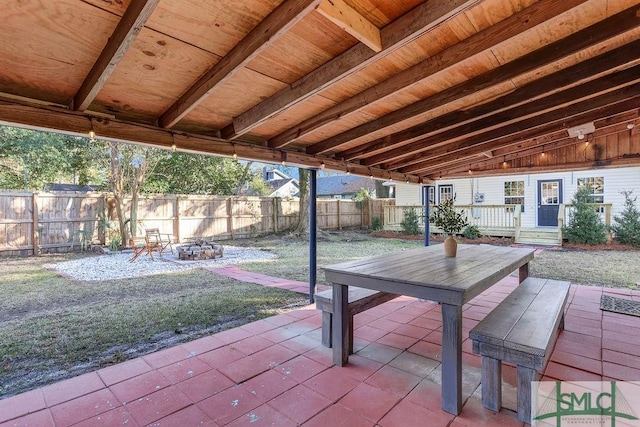 view of patio / terrace with a fire pit