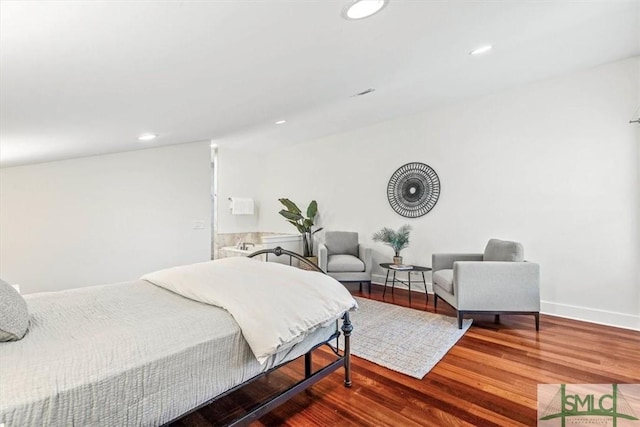 bedroom with wood-type flooring