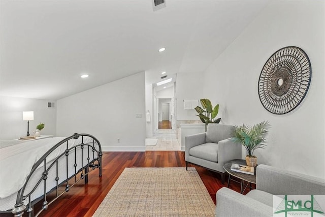 bedroom featuring hardwood / wood-style floors