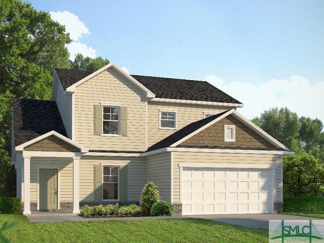 view of front of home featuring a garage and a front lawn