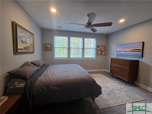 carpeted bedroom featuring ceiling fan