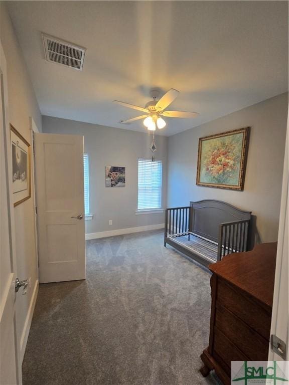 carpeted bedroom featuring ceiling fan