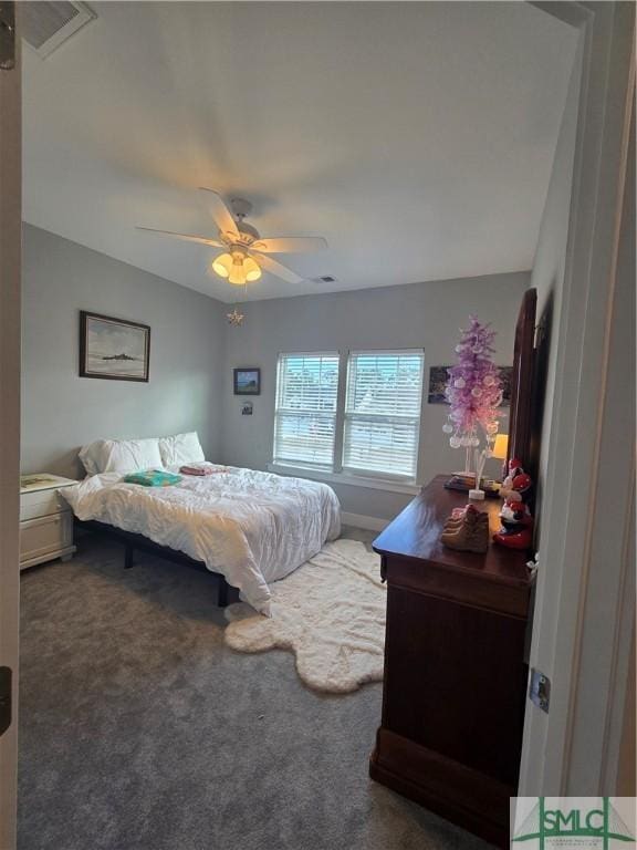 carpeted bedroom featuring ceiling fan