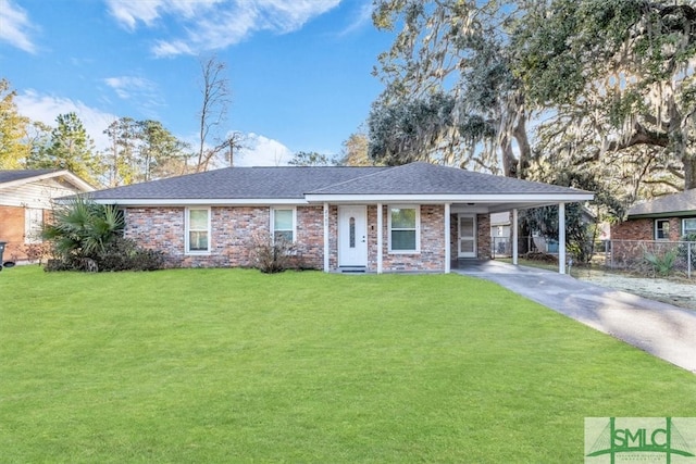 ranch-style house featuring a carport and a front lawn