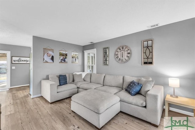 living room featuring light hardwood / wood-style floors