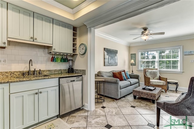 kitchen with sink, dishwasher, dark stone countertops, tasteful backsplash, and ornamental molding