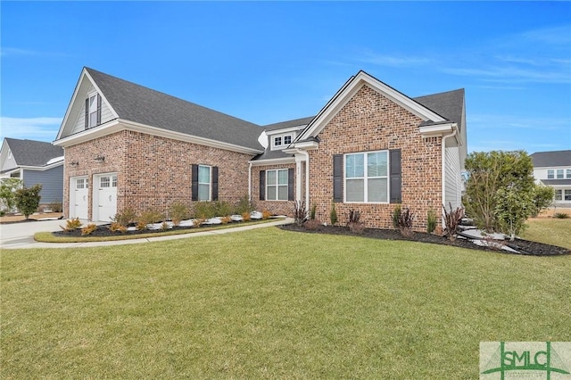 view of front property with a garage and a front lawn