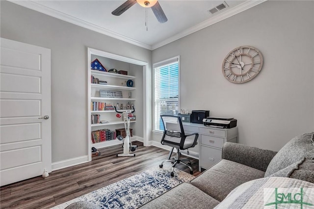 office with dark wood-type flooring, ornamental molding, and ceiling fan