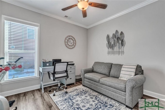 home office featuring hardwood / wood-style flooring, ornamental molding, and ceiling fan