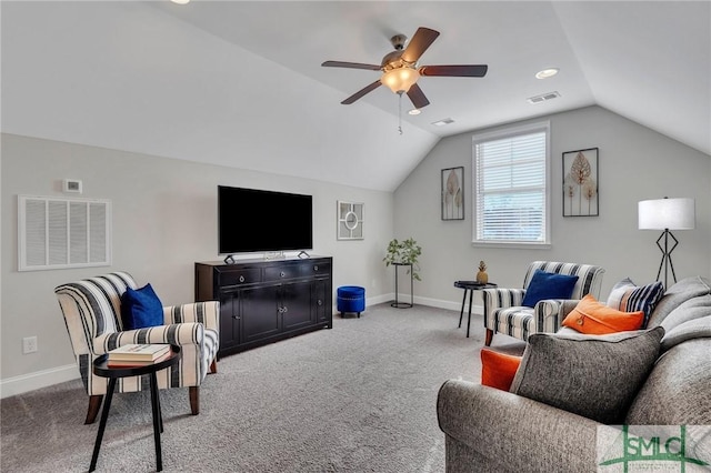 living room with ceiling fan, vaulted ceiling, and light carpet