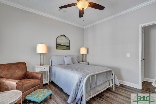 bedroom featuring ornamental molding, ceiling fan, and dark hardwood / wood-style flooring