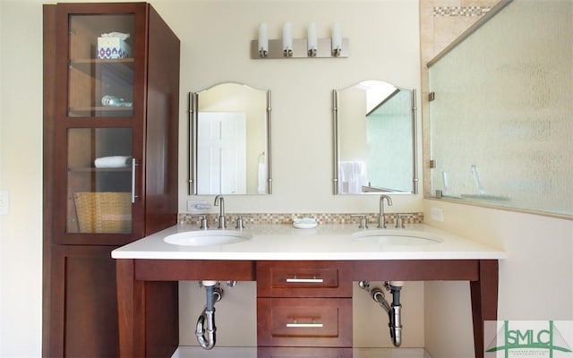 bathroom featuring sink and walk in shower