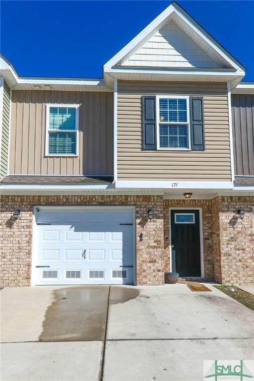 view of front of property with a garage