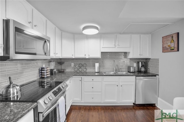 kitchen featuring white cabinetry, sink, and stainless steel appliances