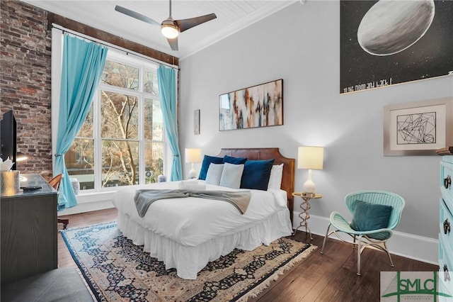 bedroom with hardwood / wood-style flooring and ornamental molding