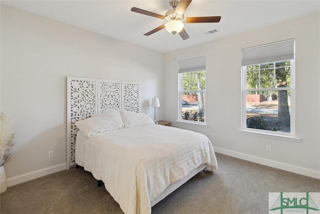 carpeted bedroom with ceiling fan