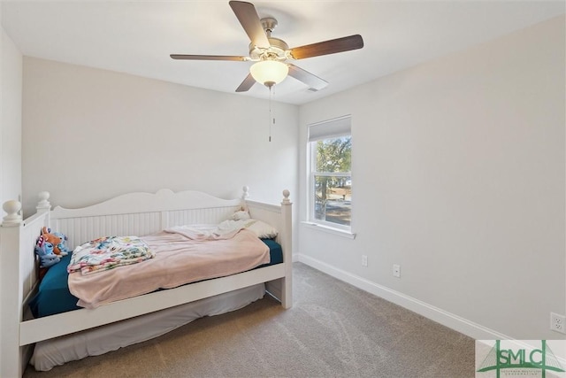 carpeted bedroom featuring ceiling fan