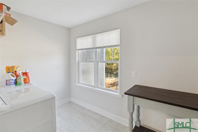 washroom with independent washer and dryer