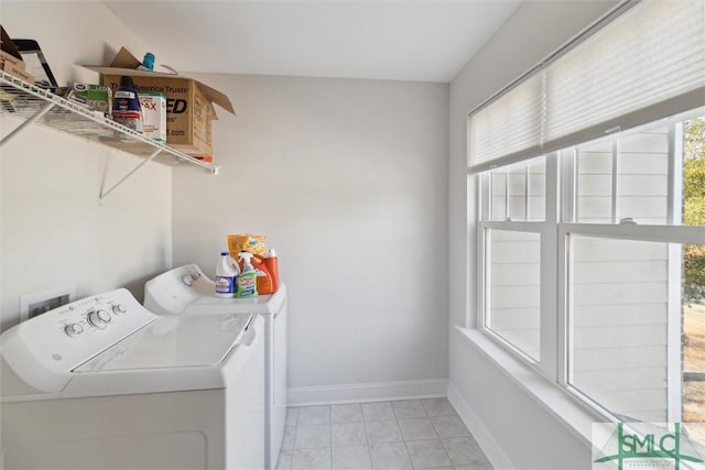 washroom featuring washing machine and clothes dryer