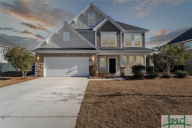 view of front of property featuring a garage