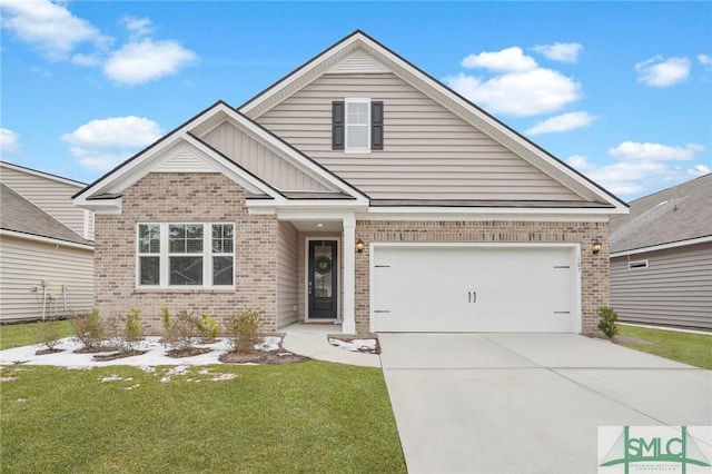 view of front facade with a garage and a front yard