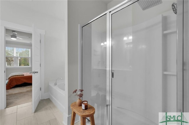 ensuite bathroom featuring tile patterned flooring, a stall shower, ensuite bathroom, and a garden tub