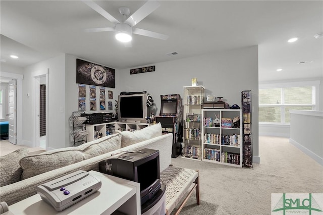 living room featuring visible vents, recessed lighting, carpet flooring, baseboards, and ceiling fan