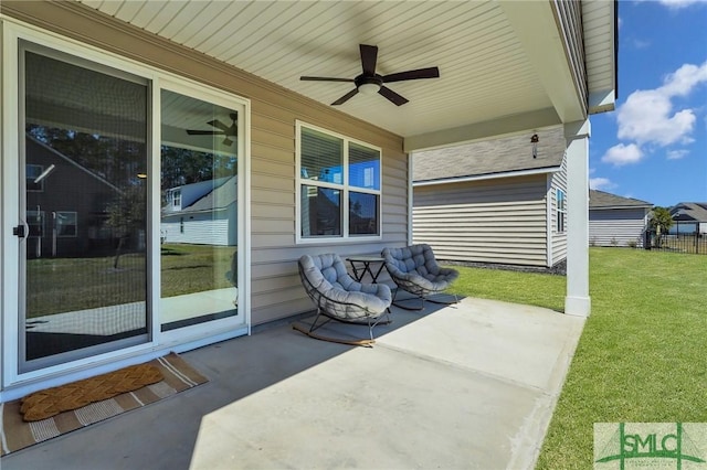 view of patio featuring a ceiling fan