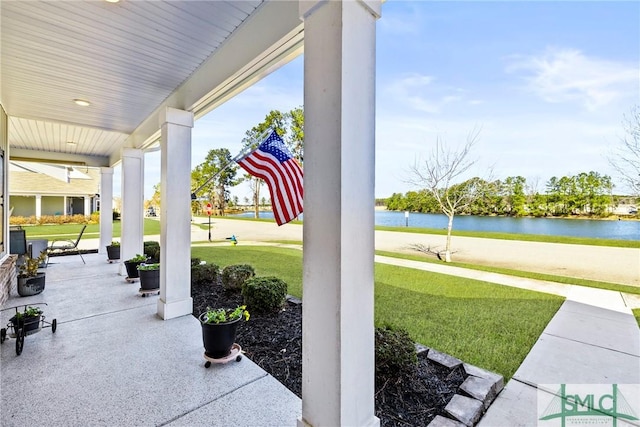 view of patio / terrace with a water view