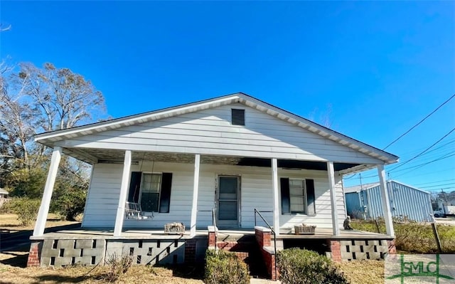 view of front of house featuring covered porch