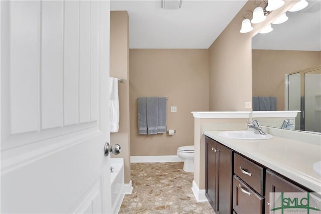 full bathroom featuring vanity, shower with separate bathtub, and toilet