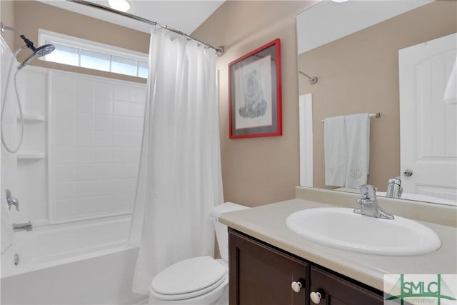 full bathroom with shower / bath combination with curtain, vanity, and toilet