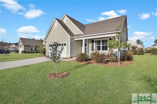 view of front facade with a garage and a front yard