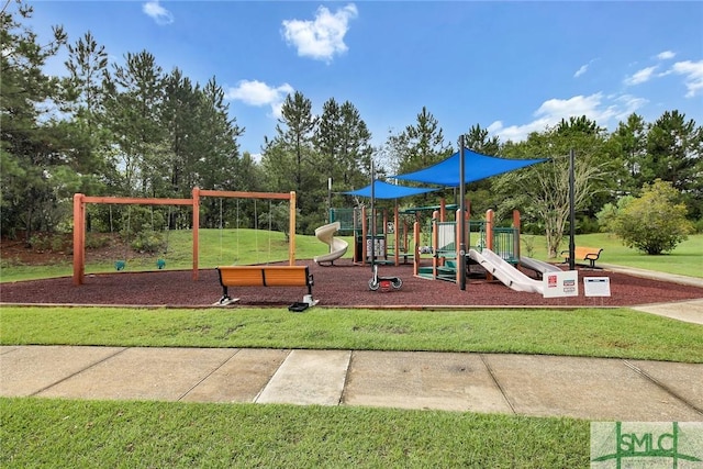 view of jungle gym with a lawn