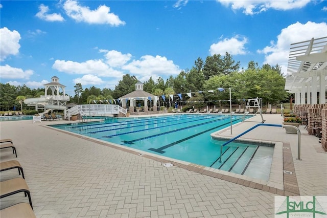 view of swimming pool with a gazebo