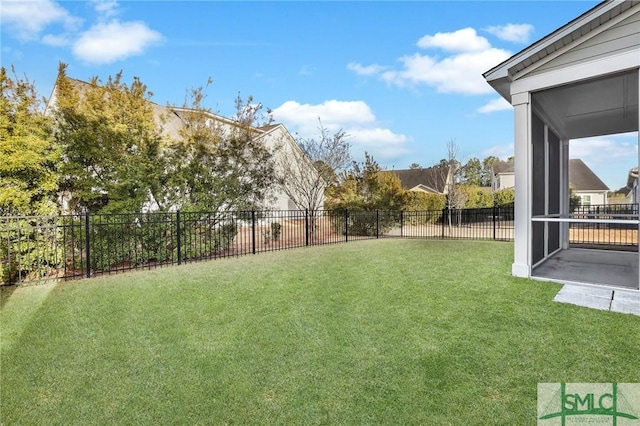 view of yard with a sunroom