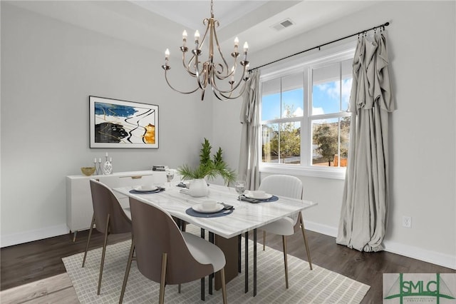 dining area featuring dark wood-type flooring