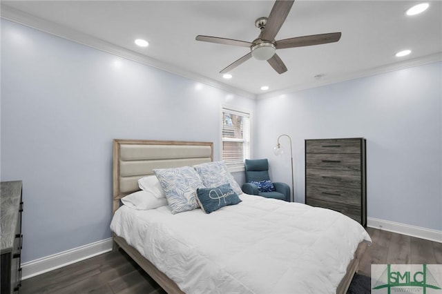 bedroom featuring ceiling fan, ornamental molding, and dark hardwood / wood-style floors