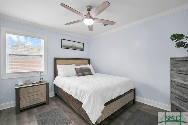 bedroom featuring ornamental molding, ceiling fan, and dark hardwood / wood-style flooring