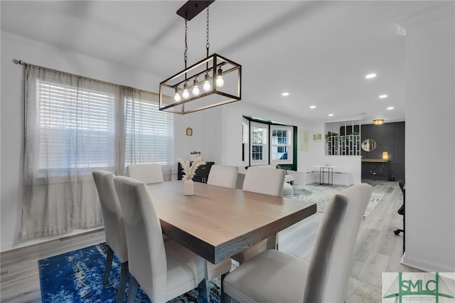 dining space featuring light hardwood / wood-style flooring