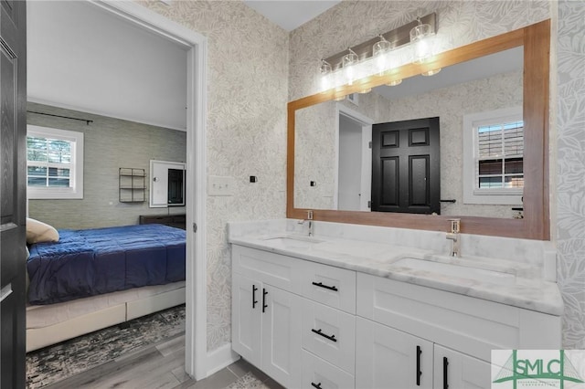 bathroom featuring vanity and hardwood / wood-style floors