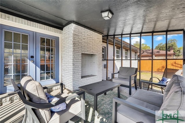 view of patio featuring a fireplace