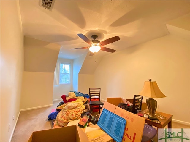 additional living space featuring carpet floors, vaulted ceiling, and ceiling fan