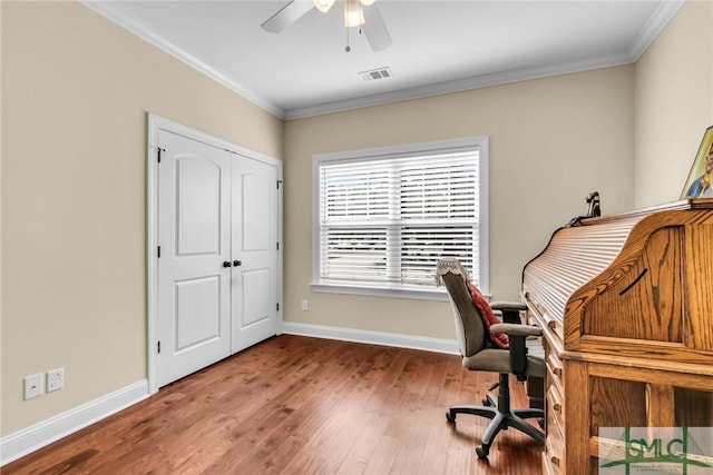 office with hardwood / wood-style flooring, ornamental molding, and ceiling fan