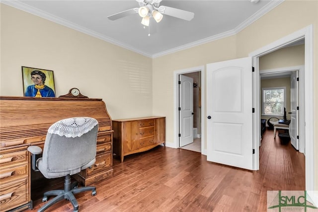 office with hardwood / wood-style flooring, ornamental molding, and ceiling fan