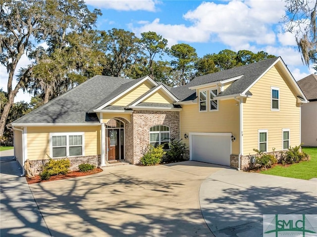 view of front of property with a garage